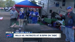 Tailgaters show off their cornhole skills on live TV