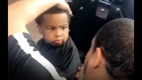 Toddler Gives Hilarious Reaction While Getting Haircut
