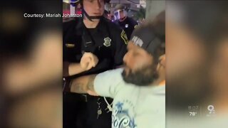 Tattoo artist arrested alongside protesters