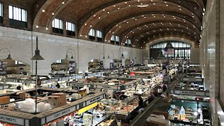 Two vendors leaving the West Side Market