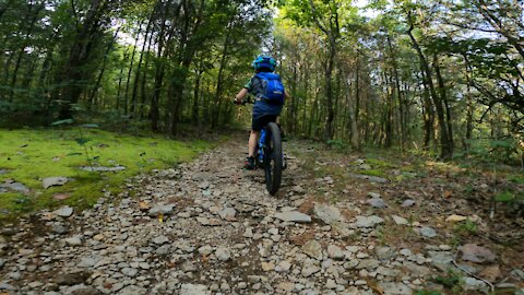 7yr old on rocky singletrack