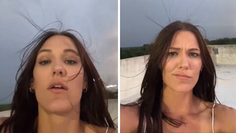 Woman has no idea how close she is to getting struck by lightning