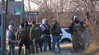 Detroit police asking public to avoid area where double murder suspect is barricaded in home