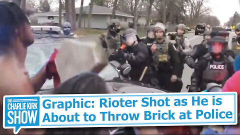 Graphic: Rioter Shot as He is About to Throw Brick at Police
