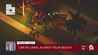 Reports of car in canal in West Palm Beach