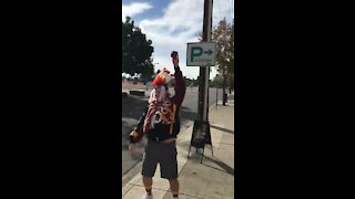 Dancing Football Fan in the street