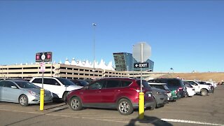 DIA officials blame upcoming holiday for parking woes