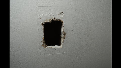 Patching a Hole in Wallboard