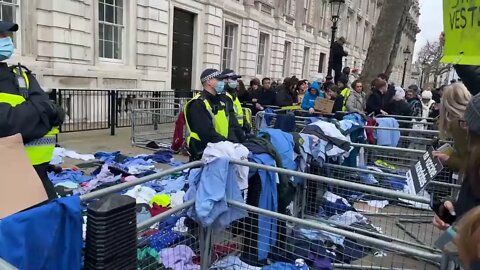Doctors and Nurses lay down their uniform outside Downing Street