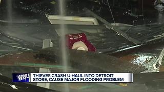Crooks use uhaul trailer to smash into Detroit business