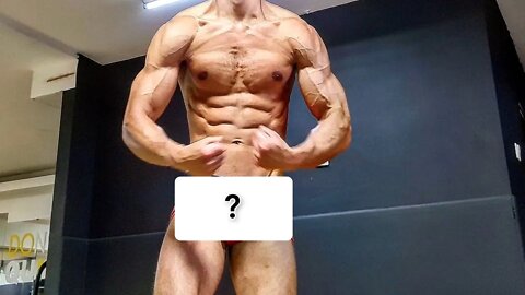 Bodybuilder flexing ALL muscles