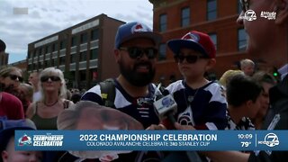 Father, son bonding over Avs Stanley Cup parade in downtown