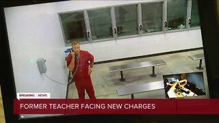 Former teacher faces new child porn charges
