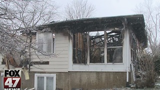 Smoke alarm saves woman from house fire