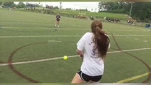 "A Teen Girl Gets Hit In The Face With A Field Hockey Puck"