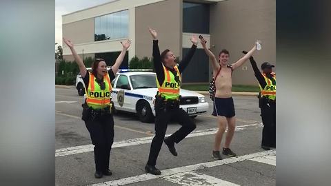 Police Officers Start YMCA Flash Mob