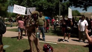 Man wearing fur and horns at June 2020 Scottsdale mask protest