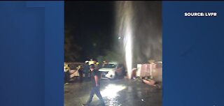 Vehicle hits water valve causing leak after 2-vehicle crash in Las Vegas