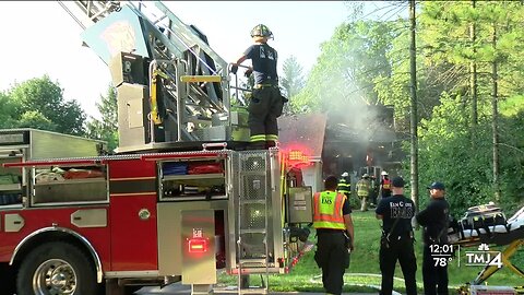 House fire in New Berlin; family of 4 and 2 dogs get out safely