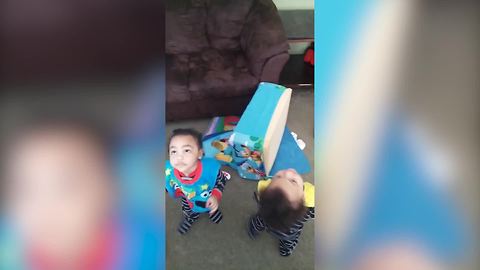 "Twin Boys Fascinated by Ceiling Fan Spinning"