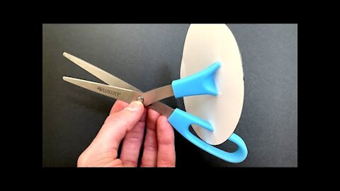 Cutting Scissors With Paper