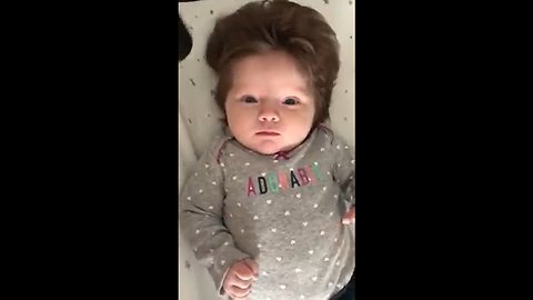 It was too chilly for her curls to air dry, so she settled for a blow out.