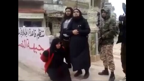TALIBAN - Public execution apparently for having feminist opinions...
