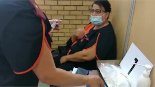 Private Healthcare workers queue for vaccine
