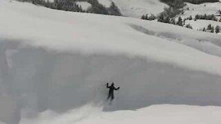 Skier crashes into wall of snow