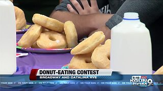 Tucson Police officers compete in doughnut eating contest