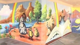 Tucson artist finishes latest mural at Kirk-Bear Canyon Library