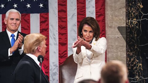 Pelosi clapping like an idiot.