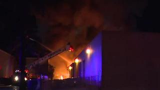 Three alarm fire rips through businesses