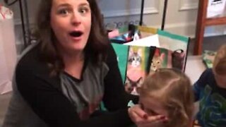 Little girl swears when she opens present