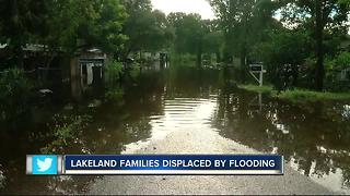 Tropical storm Emily floods family out of their home