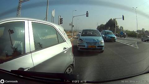 Horrible distracted driver causes double rear-ender
