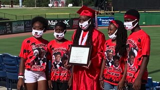 Jacquez Welch's mom walks the stage for her son at high school graduation ceremony