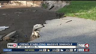 Crews look at stability of Florida sinkhole that ate 2 homes