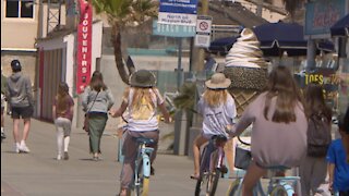 San Diego businesses benefiting off spring break traffic, officials continue to warn about pandemic safety
