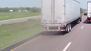 Damaged Tire Of Passing Truck Blows With Loud Sound