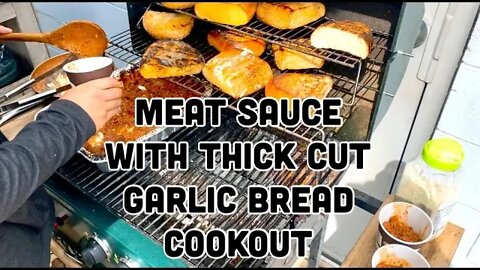 Meat sauce and thick cut garlic bread cookout