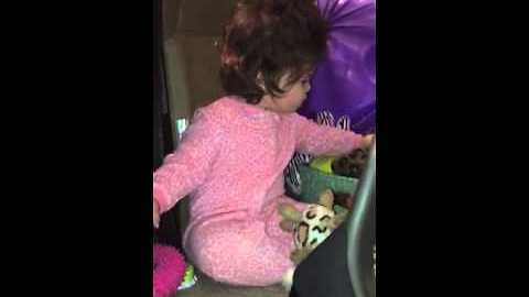 Baby squeezes dog toy, scares herself to tears