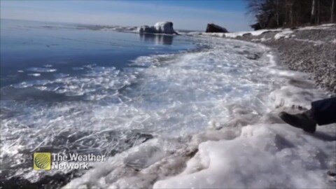 Mesmerizing ice shove against the shore on a sunny day