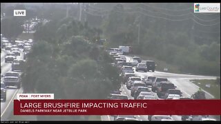 Traffic delayed along I-75 due to brush fire