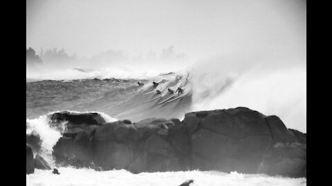 Tsunami wave - Surfer surfing a big wave 🌊