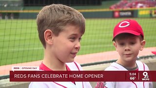 Fans celebrate Reds home opener