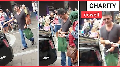 Simon Cowell gives £20 to street beggar