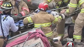 Building collapses with worker inside