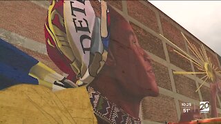 Detroit marks 100th mural painted by local artist Waleed Johnson