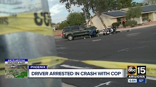 Arrest made after driver allegedly hit motorcycle officer in Phoenix